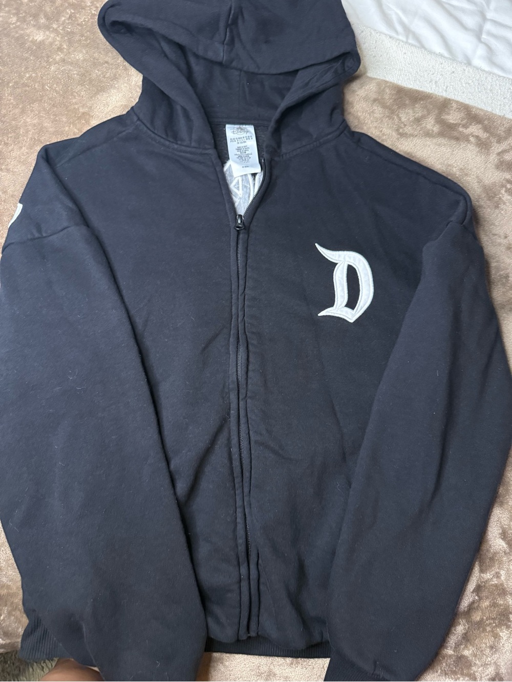 Disney Black Zip Hoodie with White Tag Detail